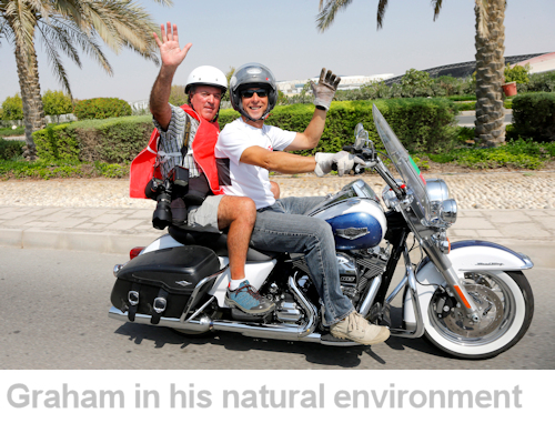 graham watson on the back of a motorcycle